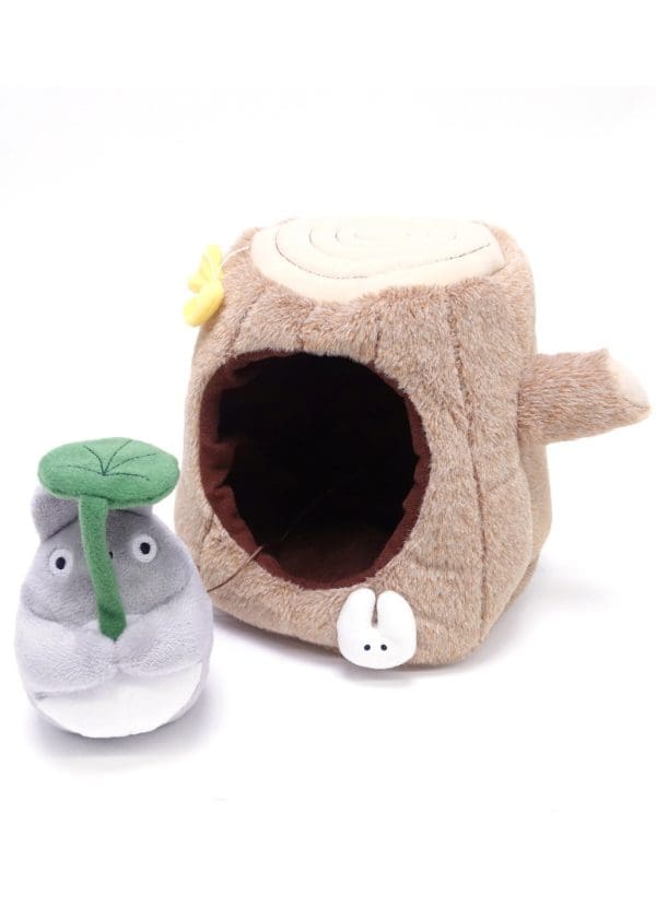 Studio Ghibli Medium-Sized Plush of Totoro with Stump House, capturing the charm of the beloved character in a whimsical setting.